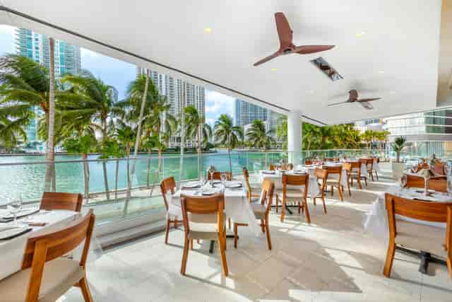 Elegant waterfront dining at Mastro's Steakhouse, perfect for business meetings and events.