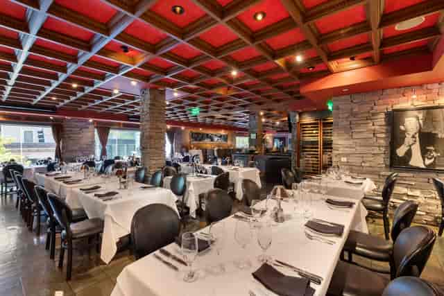 Upstairs Buyout at Mastro's: elegant dining setup for corporate events and private gatherings.