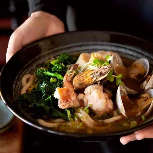 Vibrant seafood noodles dish at Sushi Ran, perfect for culinary events and gatherings.