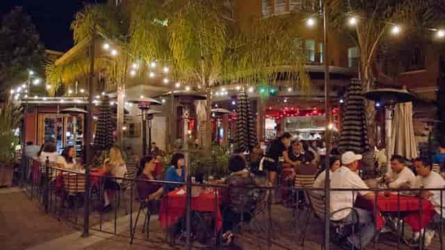 Vibrant patio dining at Milagros Latin Kitchen, perfect for casual networking events.