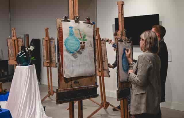 Creative painting workshop with easels at The Art Academy, ideal for team-building events.