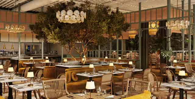 Dining area at Martins West Gastropub with central tree, ideal for upscale events and gatherings.
