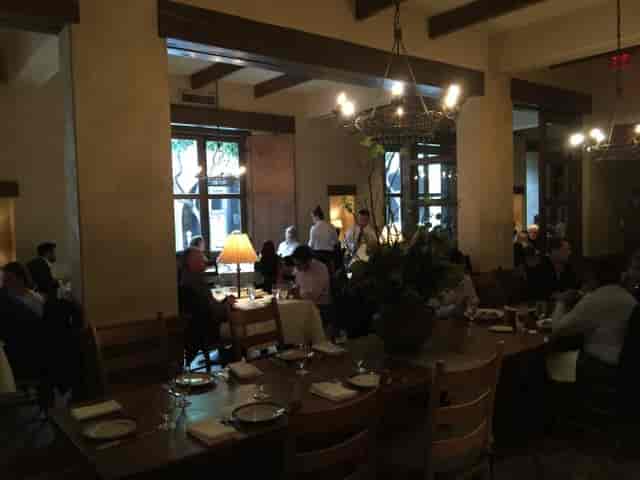 Cozy dining room at Kokkari Estiatorio, perfect for intimate corporate events.