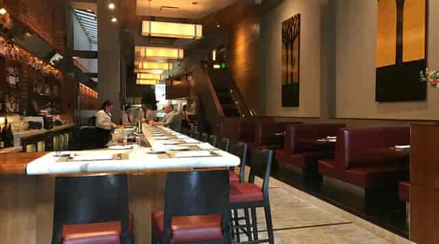 Modern restaurant Chef's Table in Perbacco, cozy seating perfect for intimate events.