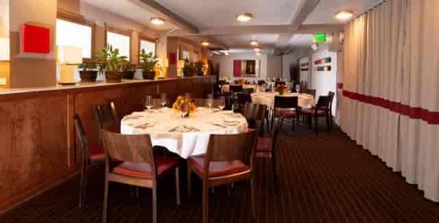 Elegant dining setup in Barolo for intimate gatherings and corporate events.