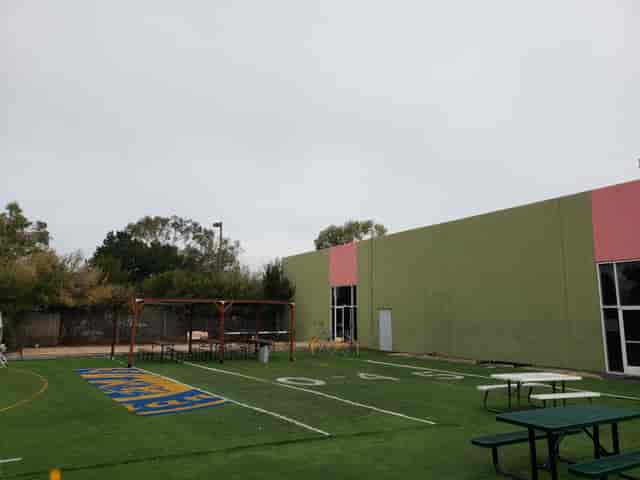 Outdoor venue in Menlo Park with grassy area for team-building events and receptions.