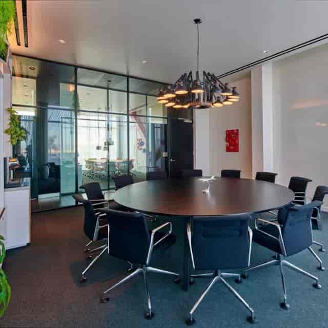Modern Menlo Park conference room with circular table for collaborative meetings.