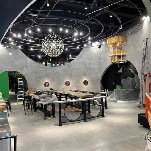 Stylish industrial event space setup at Fox Venues with dramatic lighting and flexibility.
