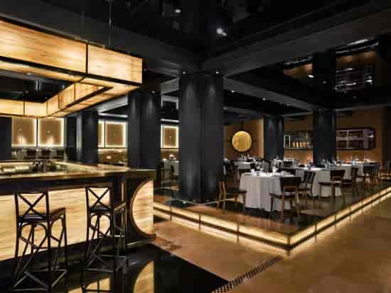 Sophisticated dining area in Jing Yaa Tang for corporate events and social gatherings.