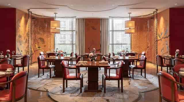 Elegant dining space at Grand Hotel Beijing, perfect for business meetings and upscale events.