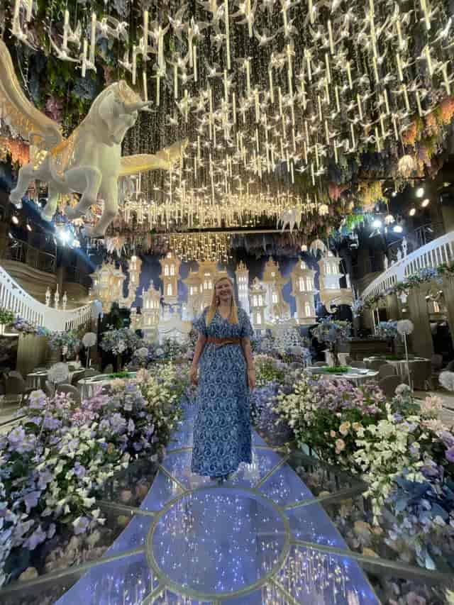 Elegant wedding venue at Xinyuan Hotel with floral decor and whimsical lighting.