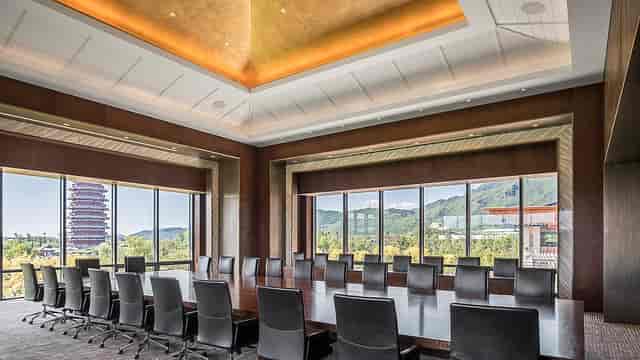 Grand Conference Hall at Yanqi Lake, featuring a large table for executive meetings.