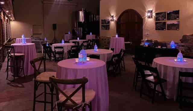 Elegant winery event space in La Honda with pink linens for intimate gatherings.