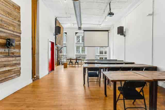Soho Designer Loft Venue with wooden flooring ideal for workshops and meetings.