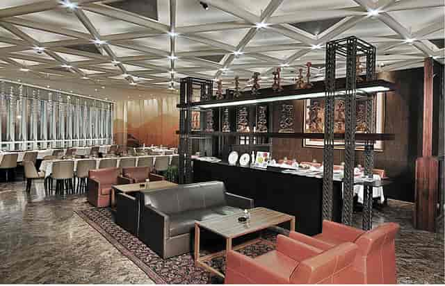 Elegant dining area in AMUZ Gourmet Restaurant, ideal for upscale events and meetings.