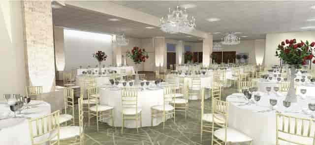 Elegant banquet hall with round tables, perfect for weddings and corporate events.