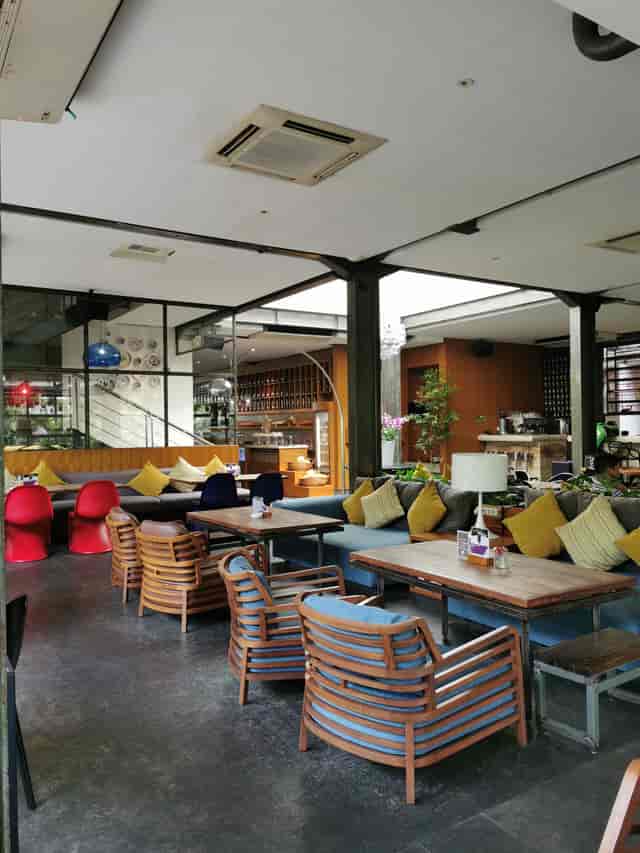 Outdoor event space at FJ Bistro & Deli with modern seating, ideal for networking and meetings.