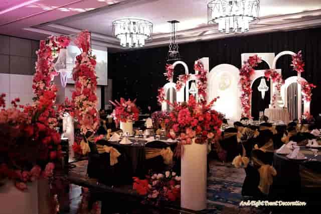 Elegant banquet hall with floral decor, ideal for weddings and upscale events.