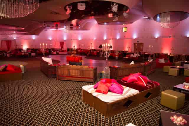 Elegant Millennium Suite event space with plush seating, ideal for corporate gatherings.