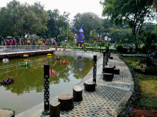 Aster park in Jakarta Expo with pond, ideal for outdoor events and gatherings.