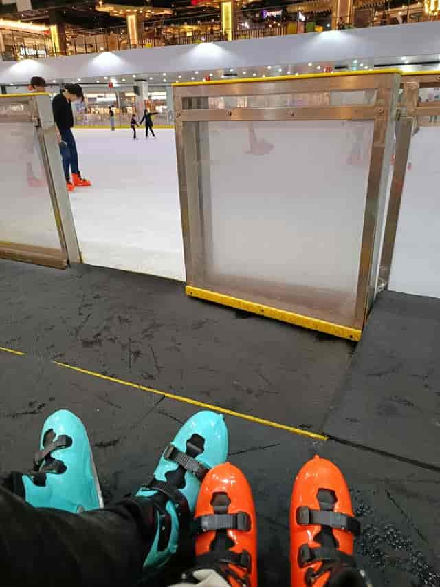 Turquoise ice skates at Oasis Centre Arena, perfect for team-building events and corporate outings.