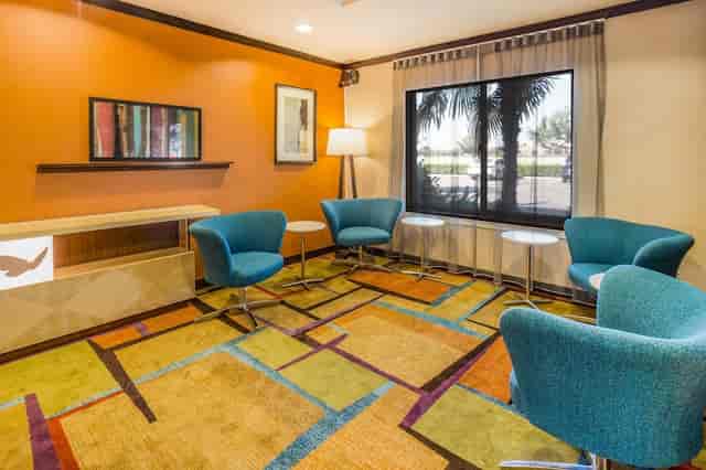 Inviting meeting space with colorful furnishings for informal gatherings and networking.