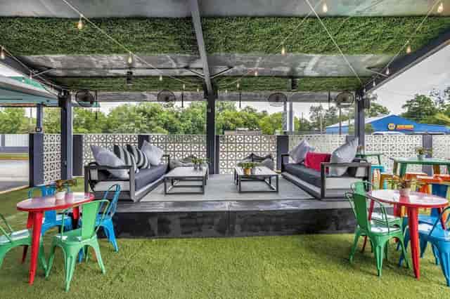 Vibrant outdoor lounge at Heights House Hotel, perfect for networking events and gatherings.
