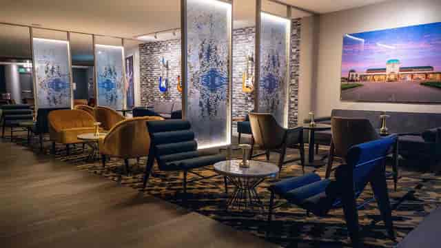 Modern lounge at Mercedes-Benz of Sugar Land for networking events and casual meetings.