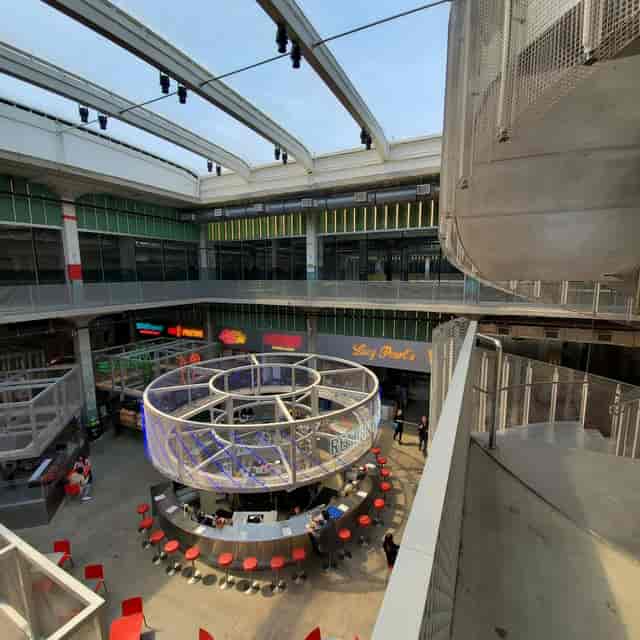 X Atrium in POST: vibrant venue with natural light for meetings and events.