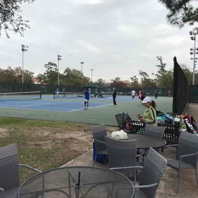 Outdoor tennis courts in Houston for team-building events and recreational retreats.