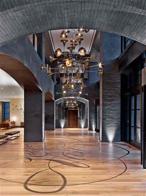 Lady Bird Studio with a brass chandelier, ideal for corporate events and receptions.