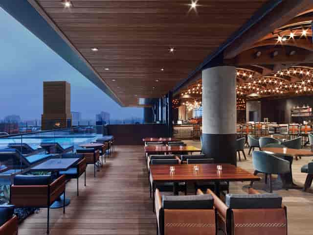 Rooftop venue at Hotel Van Zandt with city skyline, ideal for upscale events and receptions.