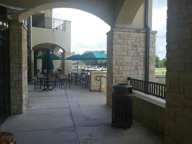 Tee Box Patio at Quail Valley: elegant outdoor terrace for gatherings and networking.