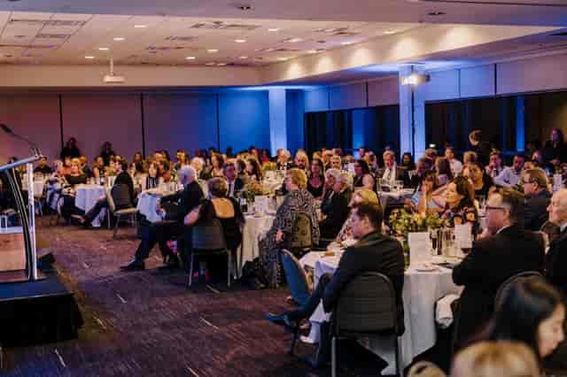 Elegant formal event at Aspire Events Centre with engaged audience and good acoustics.