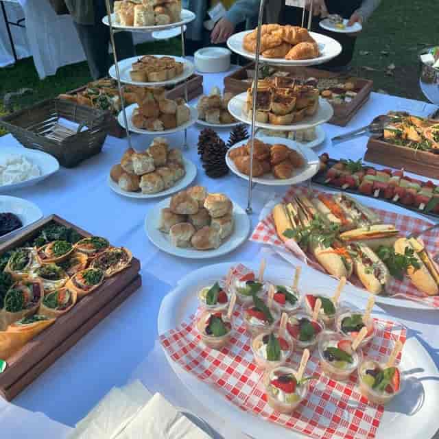 Elegant outdoor catering display with appetizers for networking events and casual gatherings.