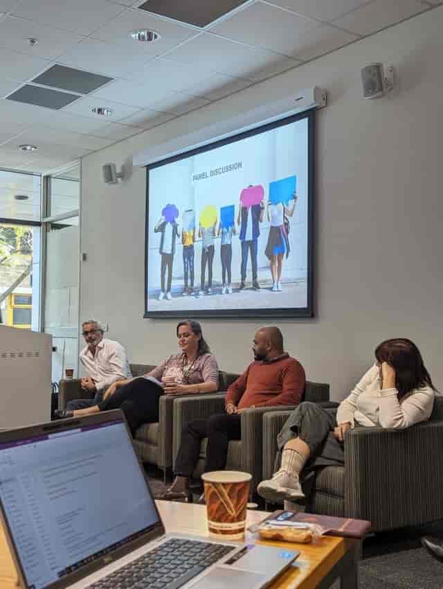 Panel discussion in modern meeting space at Aspire Events, promoting engagement and collaboration.