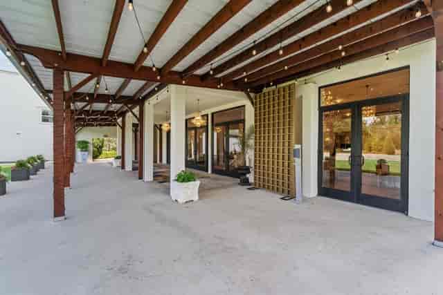 Bel Air Ballroom entrance with string lights, perfect for events and receptions in Dallas.