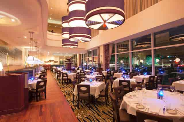 Elegant dining space at The Oceanaire for corporate events and networking dinners.