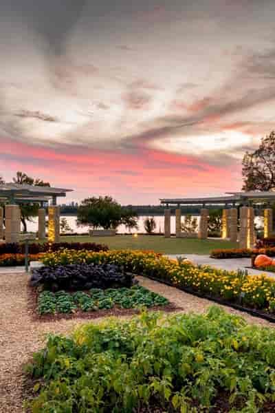 A Tasteful Place at Dallas Arboretum: Lakeside venue for weddings and events at sunset.