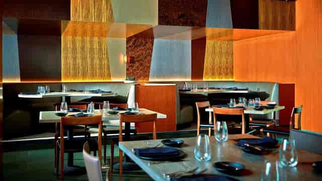 Impressionist Boardroom at The Highland Dallas: modern dining space for corporate events.