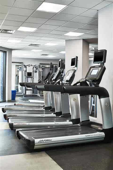 Modern fitness center at Henderson, Renaissance Dallas Hotel for corporate wellness events.