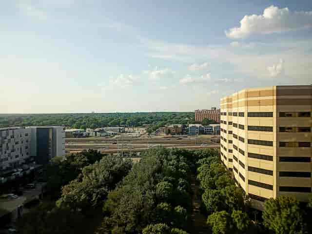Atrium Lobby at The Westin Dallas Park Central with greenery, perfect for outdoor events.