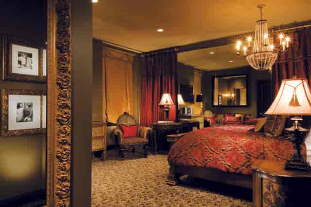 Elegant Red Room in Hotel ZaZa, perfect for retreats and VIP meetings.