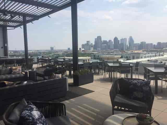 Rooftop Lounge at Canopy by Hilton, stylish venue with city skyline for upscale events.