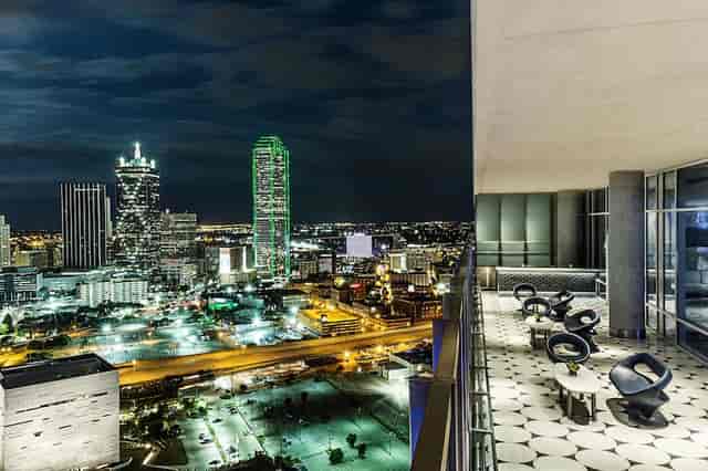 W Dallas Great Room 2 at night, featuring urban skyline views for upscale events.