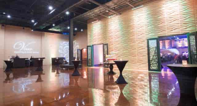 Modern event space lobby with stylish decor for corporate meetings and social gatherings.