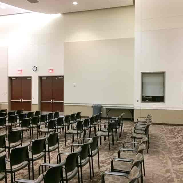 Empty meeting room setup at Collin College, ideal for presentations or discussions.