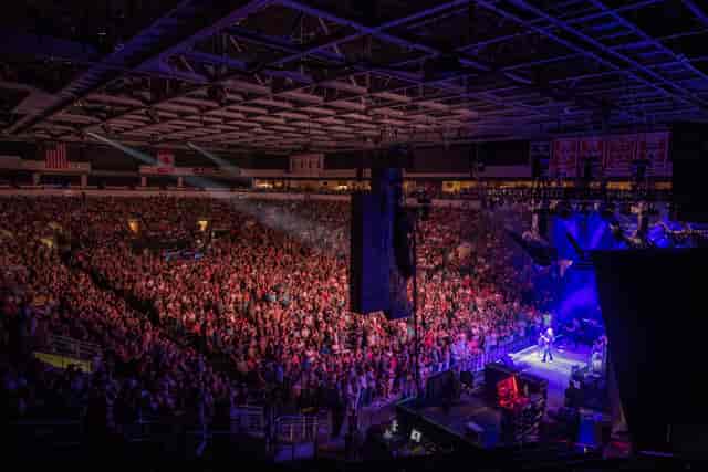 Packed stadium at Credit Union of Texas Event Center, showcasing vibrant audience engagement.
