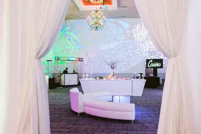Elegant Frisco Hall foyer with lounge seating for upscale corporate events and celebrations.