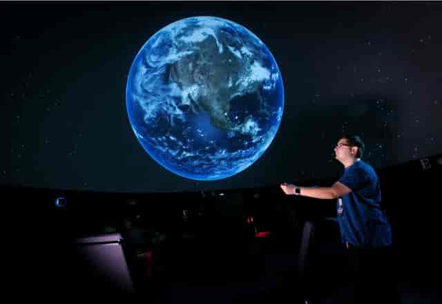 Fort Worth planetarium showcasing immersive Earth projection for educational events.